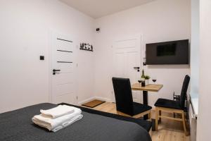 Posteľ alebo postele v izbe v ubytovaní Best Place Apartment