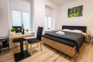 Posteľ alebo postele v izbe v ubytovaní Best Place Apartment