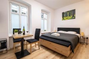 Posteľ alebo postele v izbe v ubytovaní Best Place Apartment