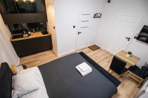Posteľ alebo postele v izbe v ubytovaní Best Place Apartment