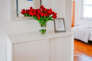 Posteľ alebo postele v izbe v ubytovaní Cherry City Stay Apartment With Parking - Happy Rentals