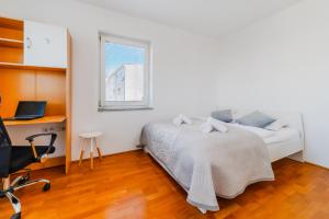 Posteľ alebo postele v izbe v ubytovaní Cherry City Stay Apartment With Parking - Happy Rentals
