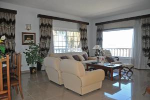 Posedenie v ubytovaní Vivienda Vacacional Paseo Mirabal