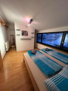 Postel nebo postele na pokoji v ubytování Bichlhaus Appartements