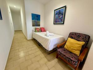 Postel nebo postele na pokoji v ubytování Apartamento Mistral Beach