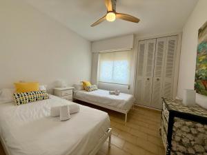 Postel nebo postele na pokoji v ubytování Apartamento Mistral Beach