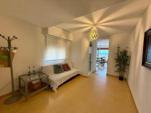 Postel nebo postele na pokoji v ubytování Apartamento Mistral Beach