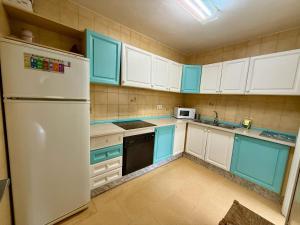 Kuchyň nebo kuchyňský kout v ubytování Apartamento Mistral Beach