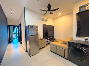 Dapur atau dapur kecil di Neu Suites By RASBO Galaxy Suites