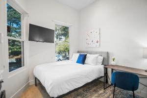 Voodi või voodid majutusasutuse Kasa The Addison San Francisco toas