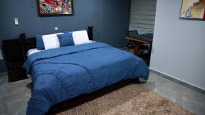 Postel nebo postele na pokoji v ubytování Riviera Apartment