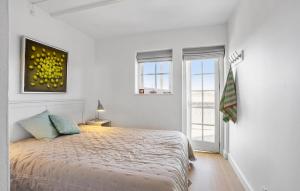 Katil atau katil-katil dalam bilik di Lovely Apartment In Bagenkop With Sauna +21 gambar