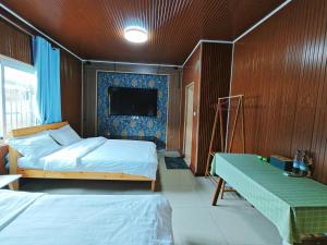 Postel nebo postele na pokoji v ubytování Roses