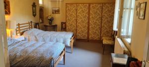 a bedroom with two beds and a window at Casa Antica Mosaici in Trivignano Udinese