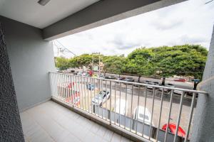 a balcony with a view of a street with cars at Hotel Montana Aeroporto by Bsb Inn in Brasília