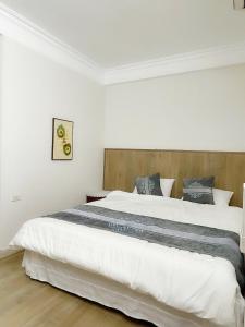 Postel nebo postele na pokoji v ubytování Airy Nest Hotel