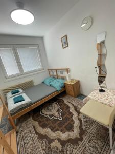 Postel nebo postele na pokoji v ubytování Rooftop Rooms Central