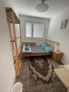 Postel nebo postele na pokoji v ubytování Rooftop Rooms Central
