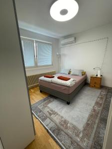 Postel nebo postele na pokoji v ubytování Rooftop Rooms Central
