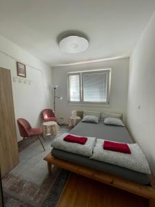 Postel nebo postele na pokoji v ubytování Rooftop Rooms Central