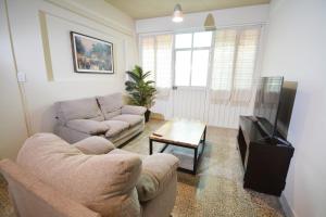 TV a/nebo společenská místnost v ubytování Departamento Runa