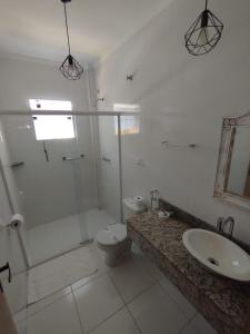 Um banheiro em Hotel Rio Penedo