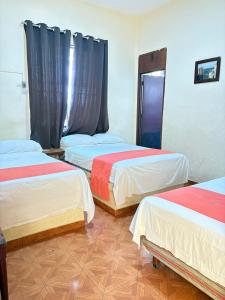 Postel nebo postele na pokoji v ubytování Xpress Inn + 4 fotografie