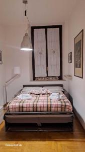 Postel nebo postele na pokoji v ubytování Delizioso appartamento in corte