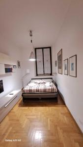 Postel nebo postele na pokoji v ubytování Delizioso appartamento in corte
