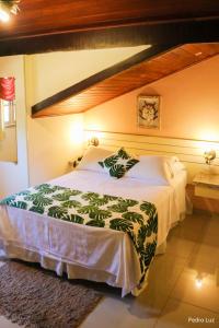 Cama ou camas em um quarto em Hotel Rio Penedo