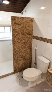 Um banheiro em Hotel Rio Penedo