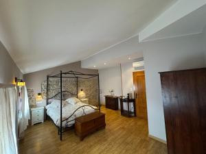 Postel nebo postele na pokoji v ubytování Casa rural marga