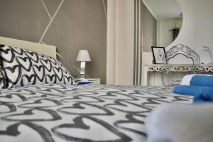Katil atau katil-katil dalam bilik di Lingotto Sweet Home +29 gambar