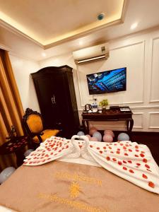 TV a/nebo společenská místnost v ubytování Majestik Hotel