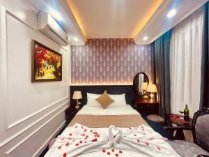 Postel nebo postele na pokoji v ubytování Majestik Hotel