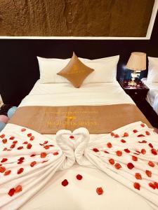 Postel nebo postele na pokoji v ubytování Majestik Hotel