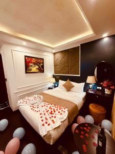 Postel nebo postele na pokoji v ubytování Majestik Hotel