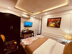 TV a/nebo společenská místnost v ubytování Majestik Hotel