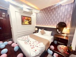Postel nebo postele na pokoji v ubytování Majestik Hotel