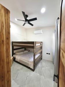 Postel nebo postele na pokoji v ubytování Casa María - Playa hermosa Cóbano + 16 fotografií