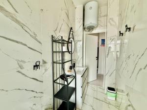 Koupelna v ubytování Lingotto Sweet Home + 28 fotografií