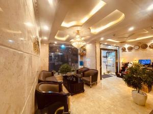 TV a/nebo společenská místnost v ubytování Majestik Hotel