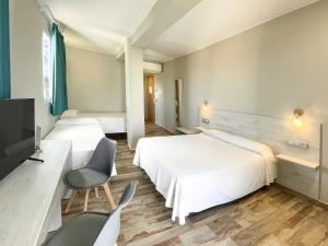 Postel nebo postele na pokoji v ubytování Te Maná Hotel