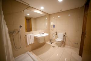 Koupelna v ubytování Hotel Bagoeira + 32 fotografií