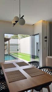 Bazén v ubytování Casa Ampla com Piscina e Área de Churrasco 400A nebo v jeho okolí
