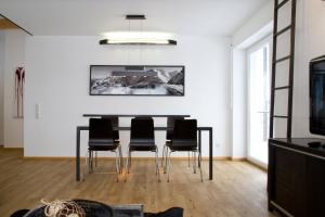 TV a/nebo společenská místnost v ubytování Arnsteiner Apartments