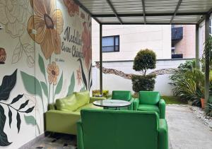 Posezení v ubytování Greenview Medellin By St Hoteles
