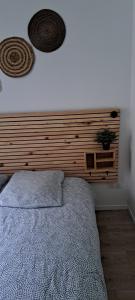 Postel nebo postele na pokoji v ubytování La Terrasse, Hyper centre au calme avec stationnement