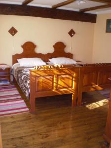 En eller flere senge i et værelse på Apartments Iža Na Trem