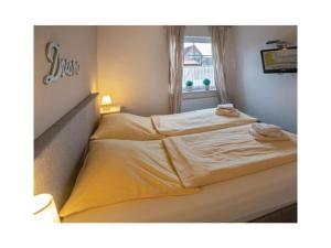 Postel nebo postele na pokoji v ubytování Holiday apartment Meerestraum